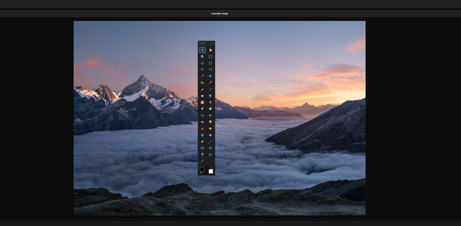Photographer workspace with alpine landscape RAW-ready edit
